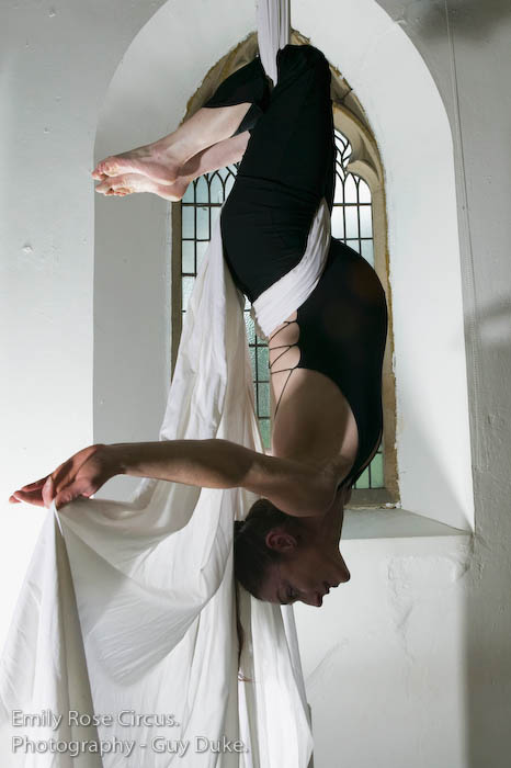 Pregnant Emily Rose on silks photography by Guy Duke